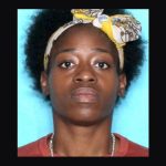 A fake card claimed Louisiana AG Liz Murrill was arrested. The mugshot on it is real — it belongs to Jazmine King, a nonprofit director charged with stealing grant money.