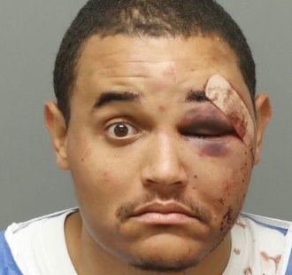 Raleigh PD detective Christopher Reed booking photo after bar brawl arrest