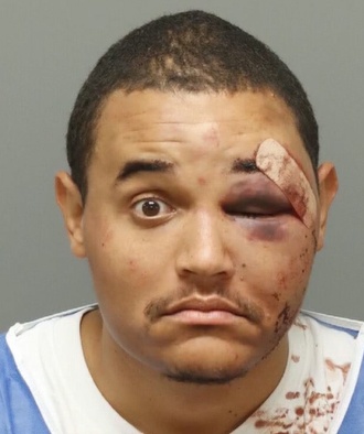 Raleigh PD detective Christopher Reed booking photo after bar brawl arrest