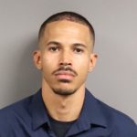 Arapahoe County CO jail deputy Kevin Lacy was fired and arrested the same day — caught not by a camera, but by a mail audit that flagged his own notes describing encounters with an inmate.